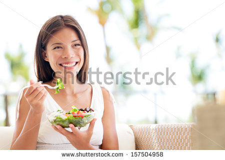stock-photo-healthy-lifestyle-woman-eating-salad-smiling-happy-outdoors-on-beautiful-day-young-female-eating-157504958